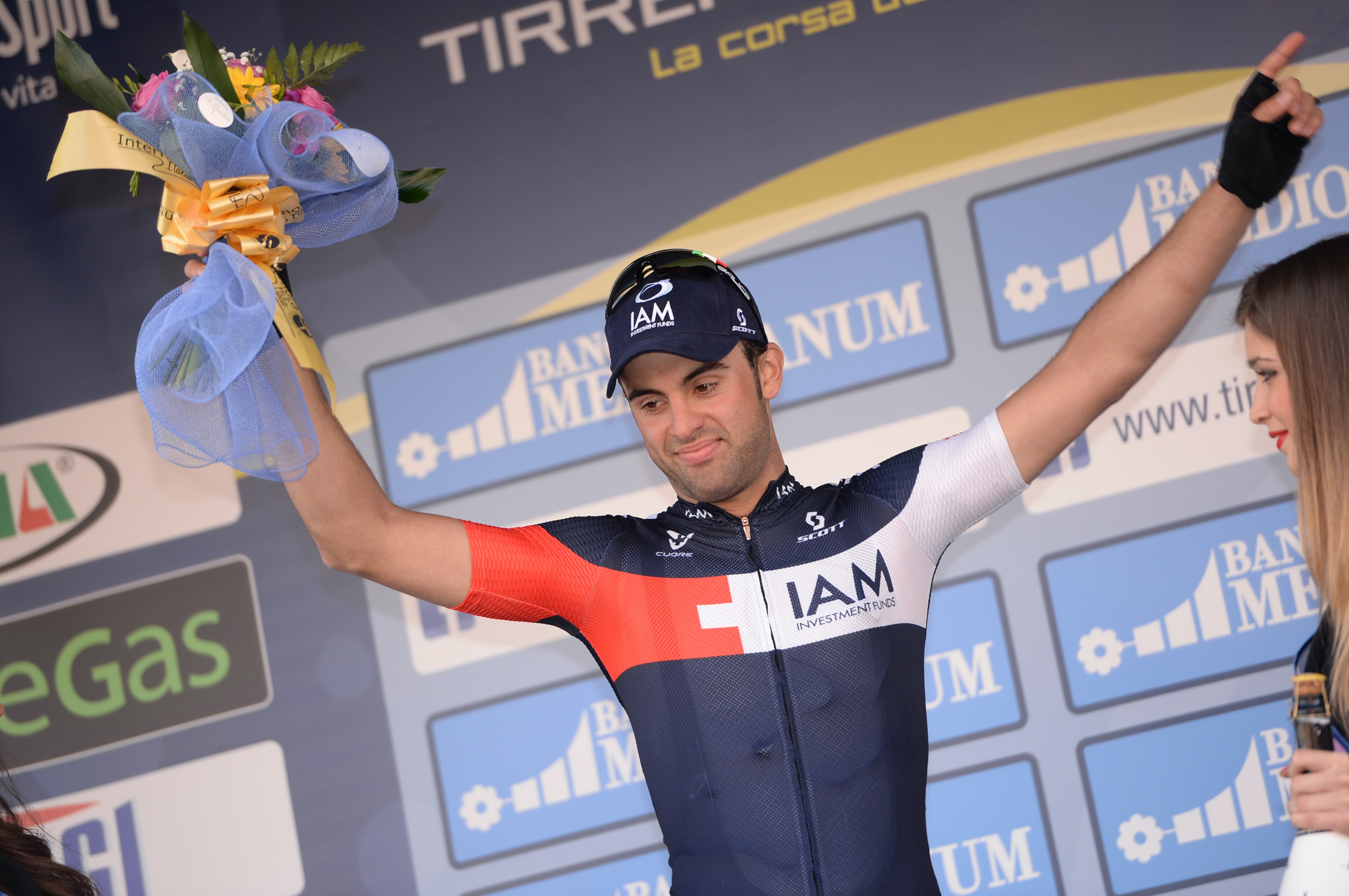 Matteo Pelucchi, IAM Cycling, champagne, podium, stage two, pic: Sirotti